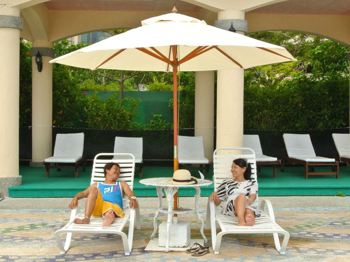 ฮาวาร์ด บีช รีสอร์ท เขิ่นติง ภายนอก รูปภาพ A patio umbrella